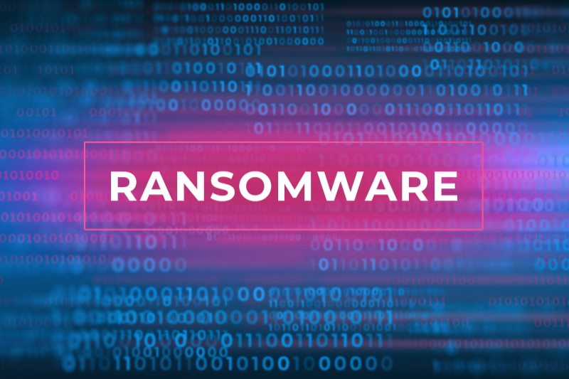 Visuel avec le mot Ransomware marqué en blanc sur un bandeau violet fluo, le tout sur un fond bleu nuit et noir.